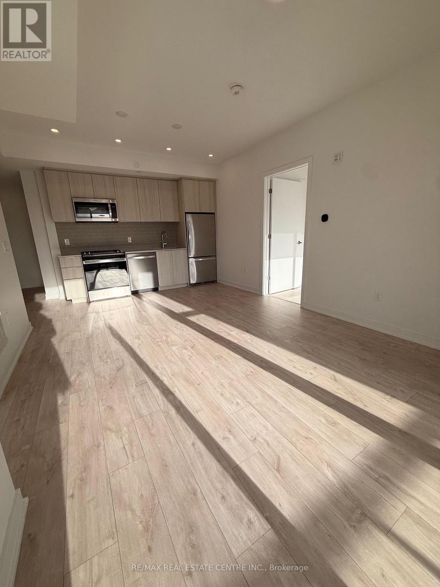 211 - 720 Whitlock Avenue, Milton, Ontario  L9E 2B5 - Photo 1 - W12693288