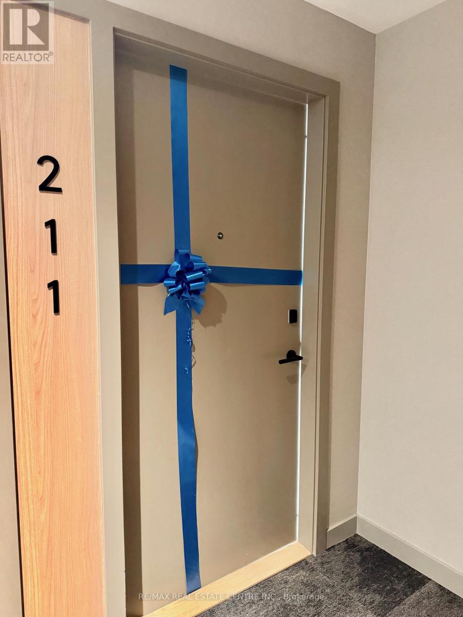 211 - 720 Whitlock Avenue, Milton, Ontario  L9E 2B5 - Photo 3 - W12693288