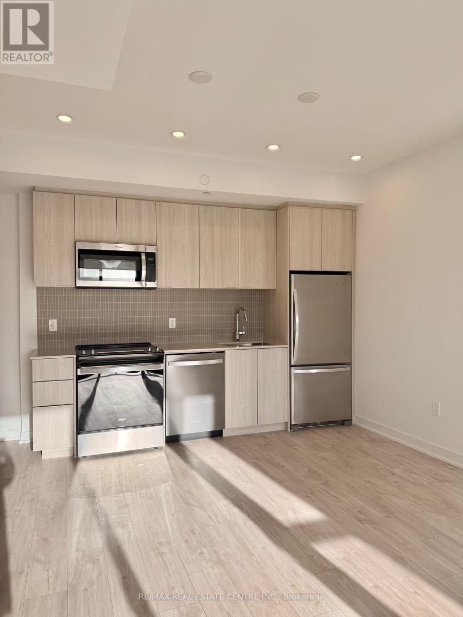 211 - 720 Whitlock Avenue, Milton, Ontario  L9E 2B5 - Photo 6 - W12693288