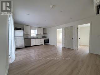 2 - 84 Foch Avenue, Toronto, Ontario  M8W 3X6 - Photo 1 - W12780472