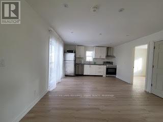 2 - 84 Foch Avenue, Toronto, Ontario  M8W 3X6 - Photo 2 - W12780472