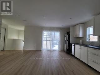 2 - 84 Foch Avenue, Toronto, Ontario  M8W 3X6 - Photo 4 - W12780472