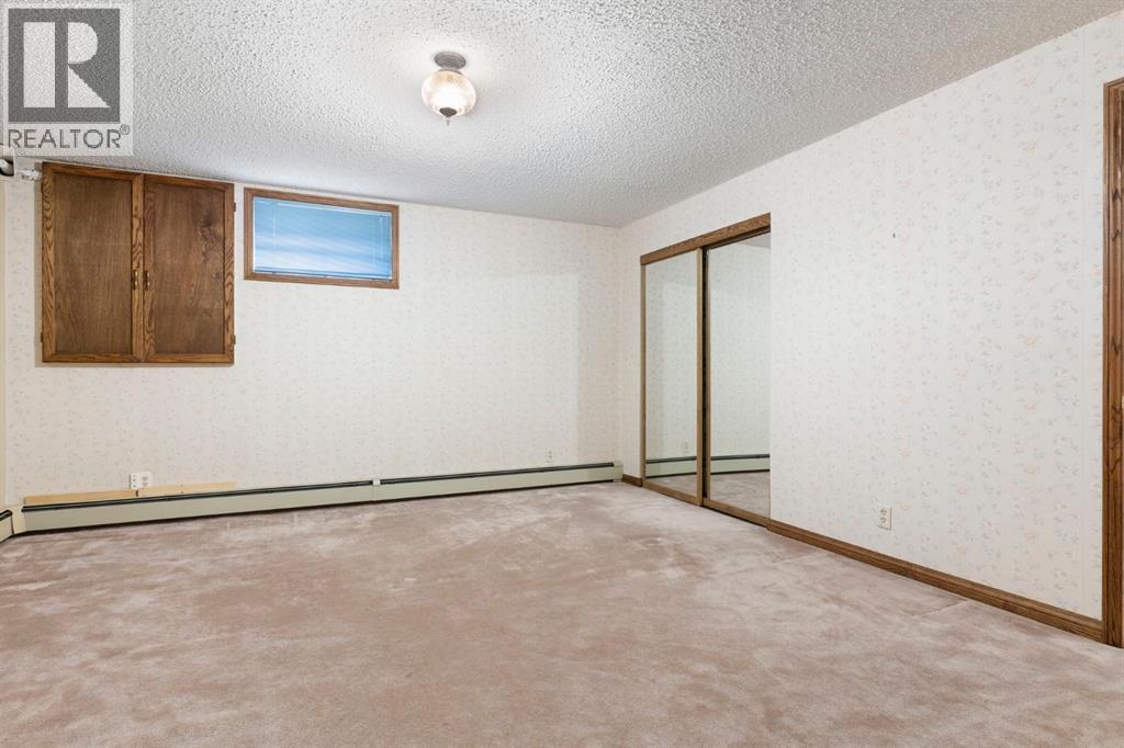 39 Coach Gate Way Sw, Calgary, Alberta  T3H 1L7 - Photo 30 - A2284475