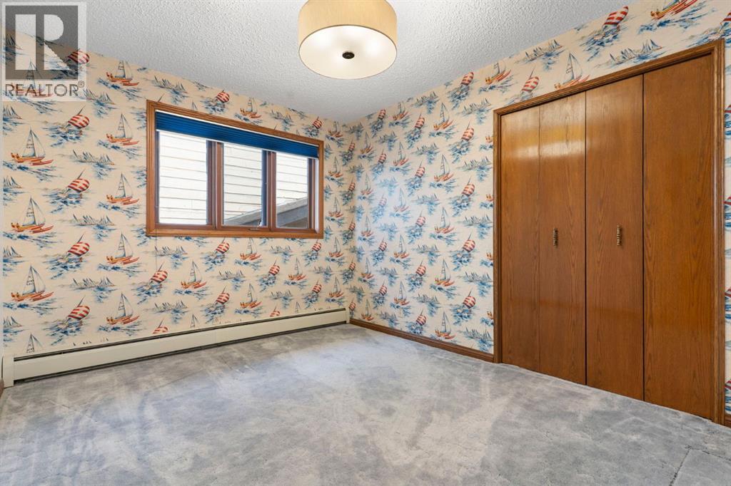 39 Coach Gate Way Sw, Calgary, Alberta  T3H 1L7 - Photo 25 - A2284475