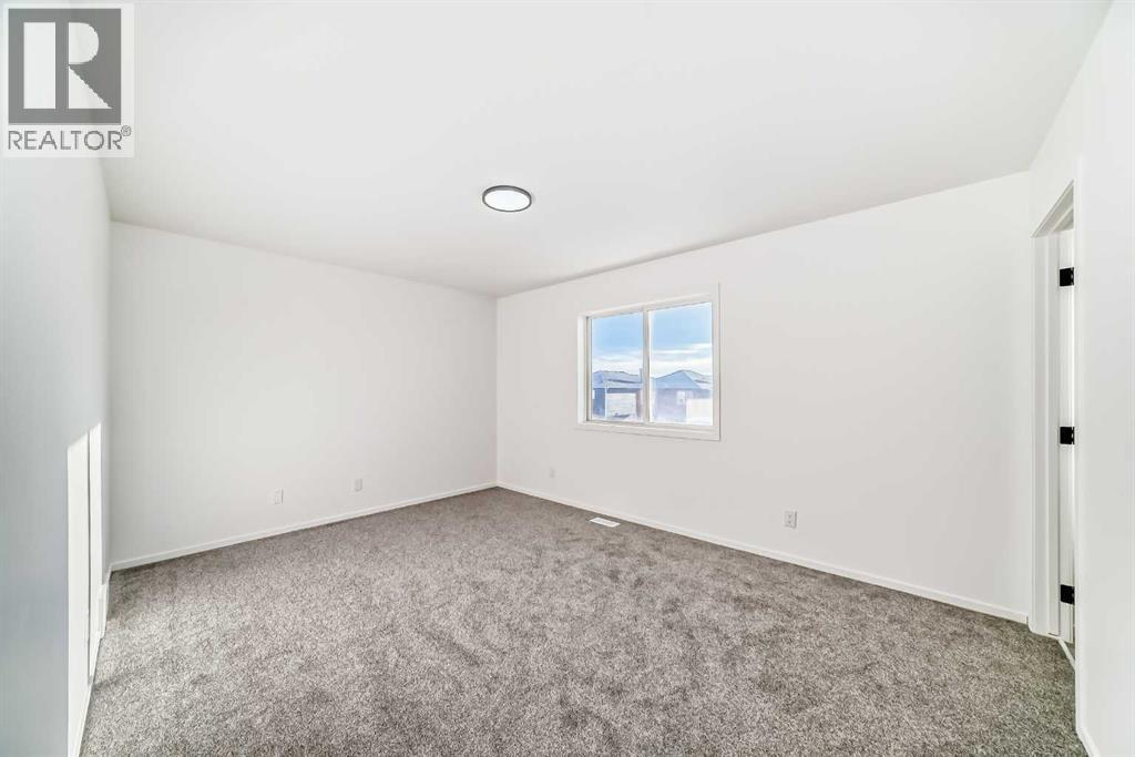 99 Saddlecrest Way Ne, Calgary, Alberta  T3J 5N1 - Photo 17 - A2276076