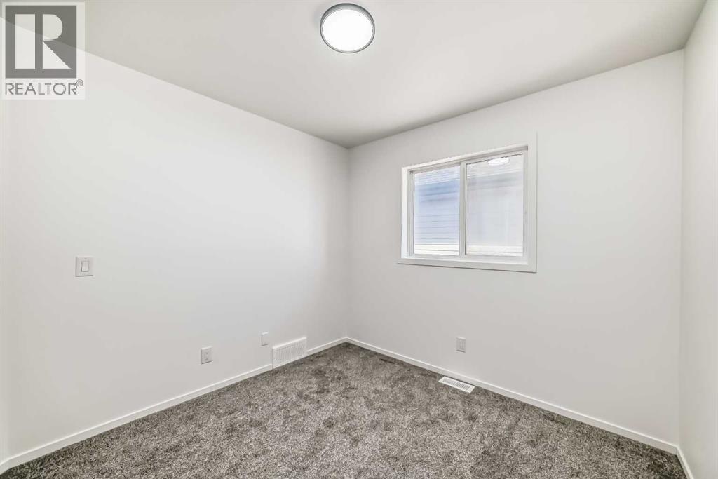 99 Saddlecrest Way Ne, Calgary, Alberta  T3J 5N1 - Photo 26 - A2276076