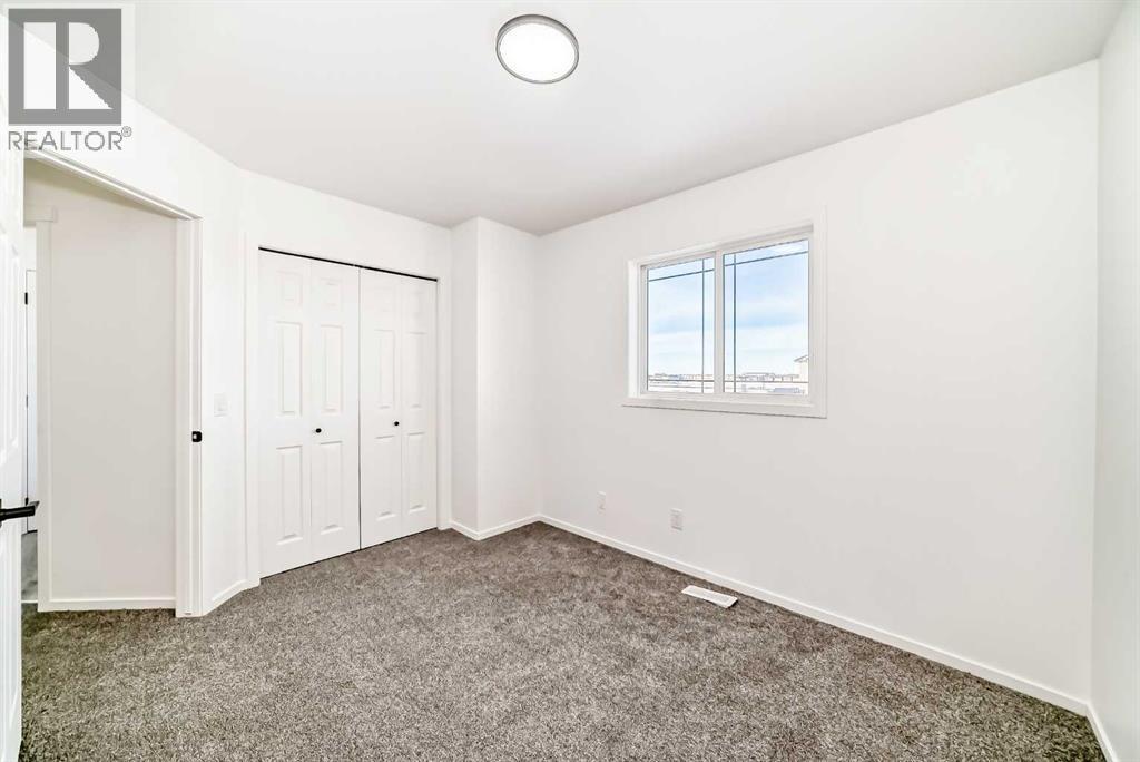 99 Saddlecrest Way Ne, Calgary, Alberta  T3J 5N1 - Photo 24 - A2276076