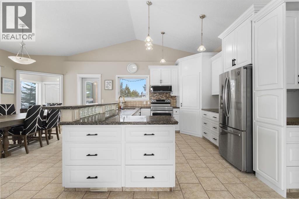 149 Sharp Hill Drive, Rural Rocky View County, Alberta  T4A 0P1 - Photo 6 - A2284437