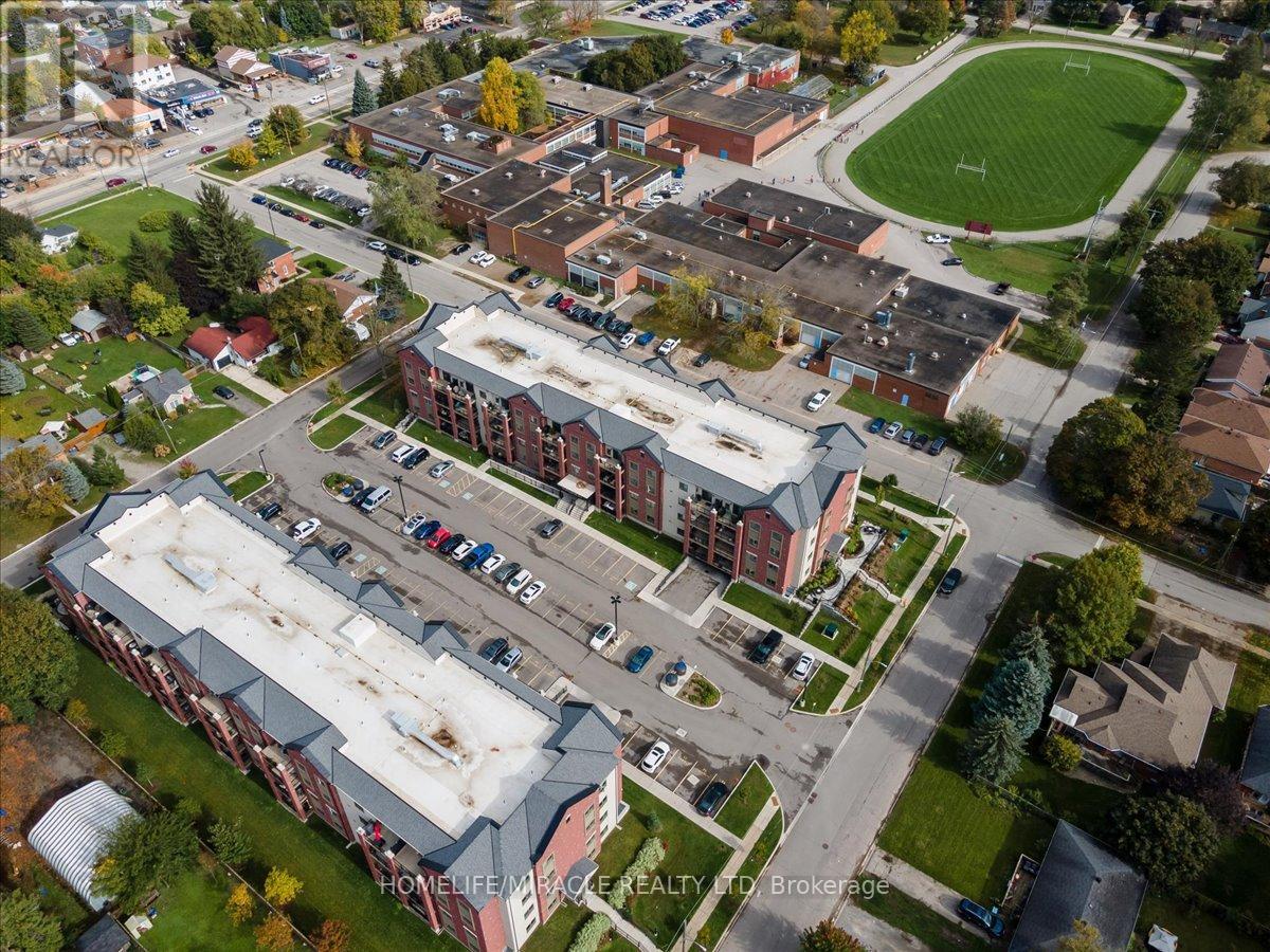 304 - 161 Wellington Street E, New Tecumseth, Ontario  L9R 0R8 - Photo 2 - N12781202