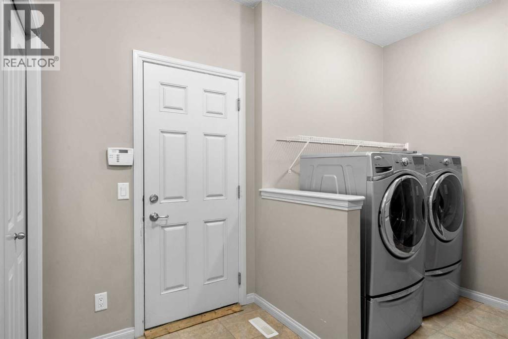 223 Sunset Square, Cochrane, Alberta  T4C 0H3 - Photo 23 - A2285084