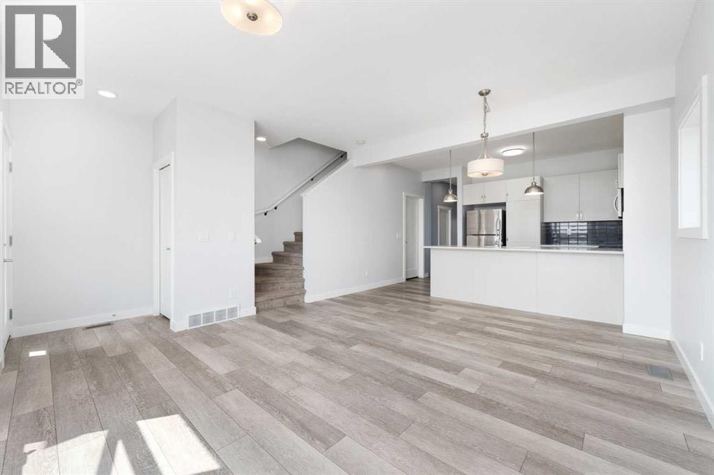 62 Walden Lane Se, Calgary, Alberta T2X 2A7 - Photo 4 - A2283776