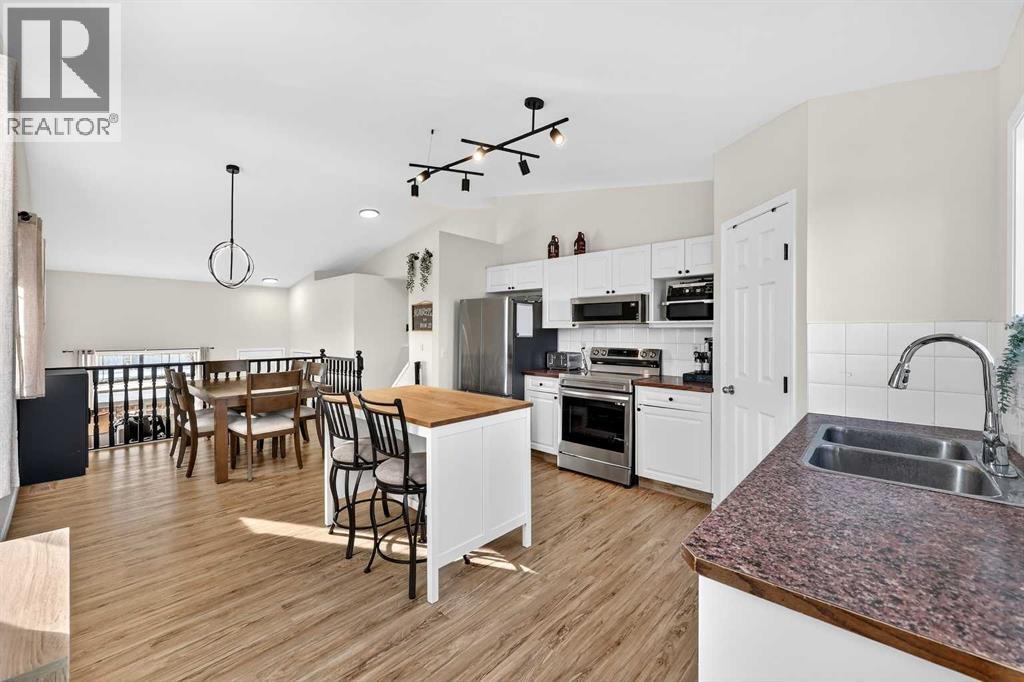 250 Cimarron Boulevard, Okotoks, Alberta  T1S 2E5 - Photo 10 - A2285608