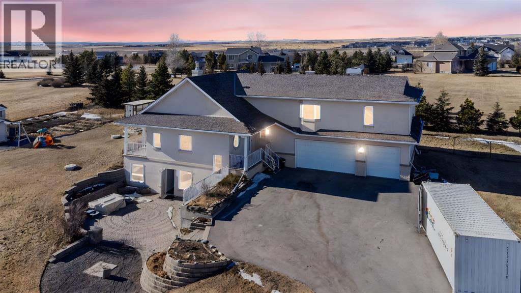 149 Sharp Hill Drive, Rural Rocky View County, Alberta  T4A 0P1 - Photo 2 - A2284437