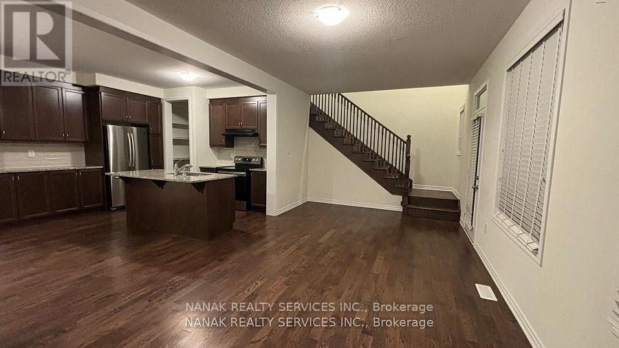 39 Boothill Drive, Brampton, Ontario  L7A 0C1 - Photo 4 - W12781682