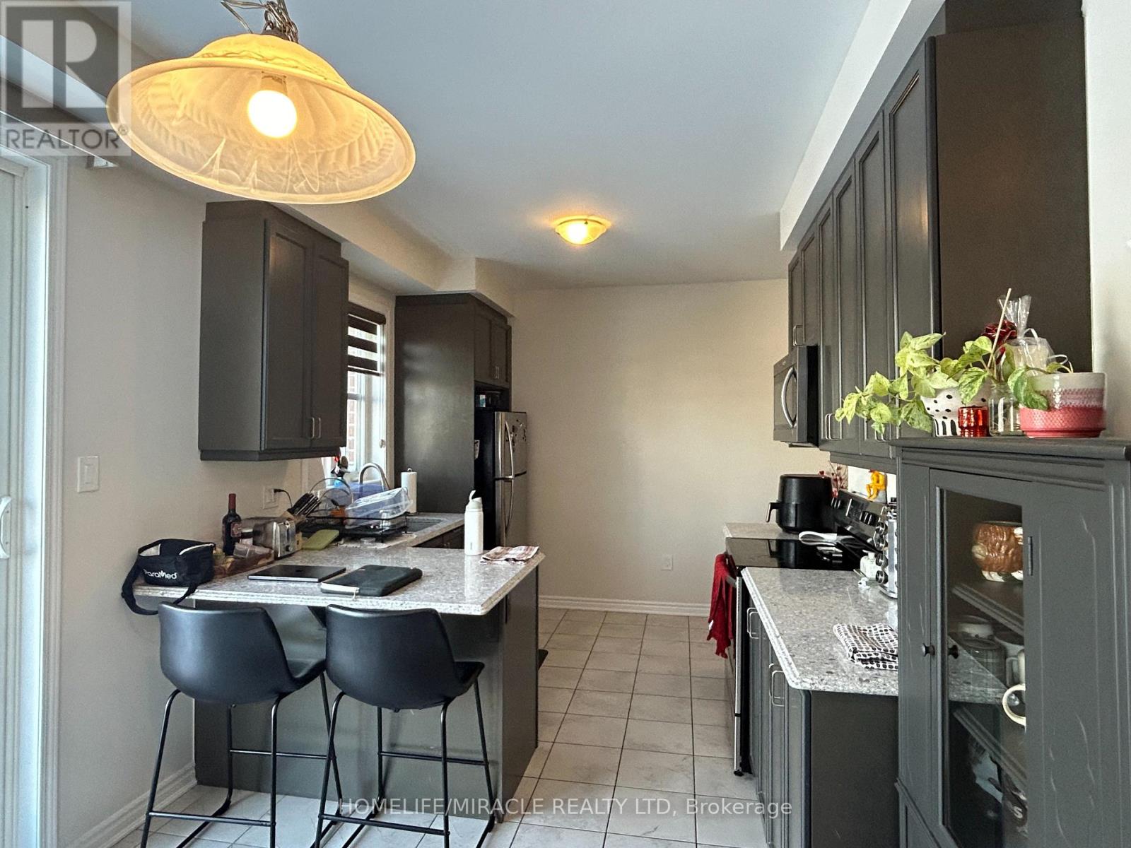 6 - 22 Spring Creek Drive, Hamilton, Ontario  L8B 1V7 - Photo 5 - X12781964