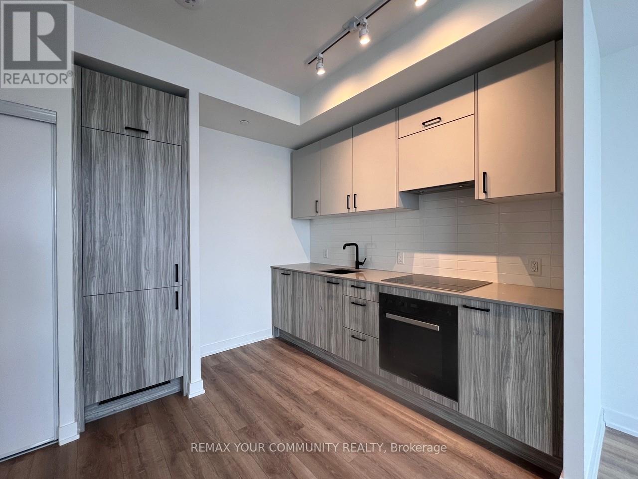 1408 - 1 Quarrington Lane, Toronto, Ontario  M3C 0S4 - Photo 4 - C12782228