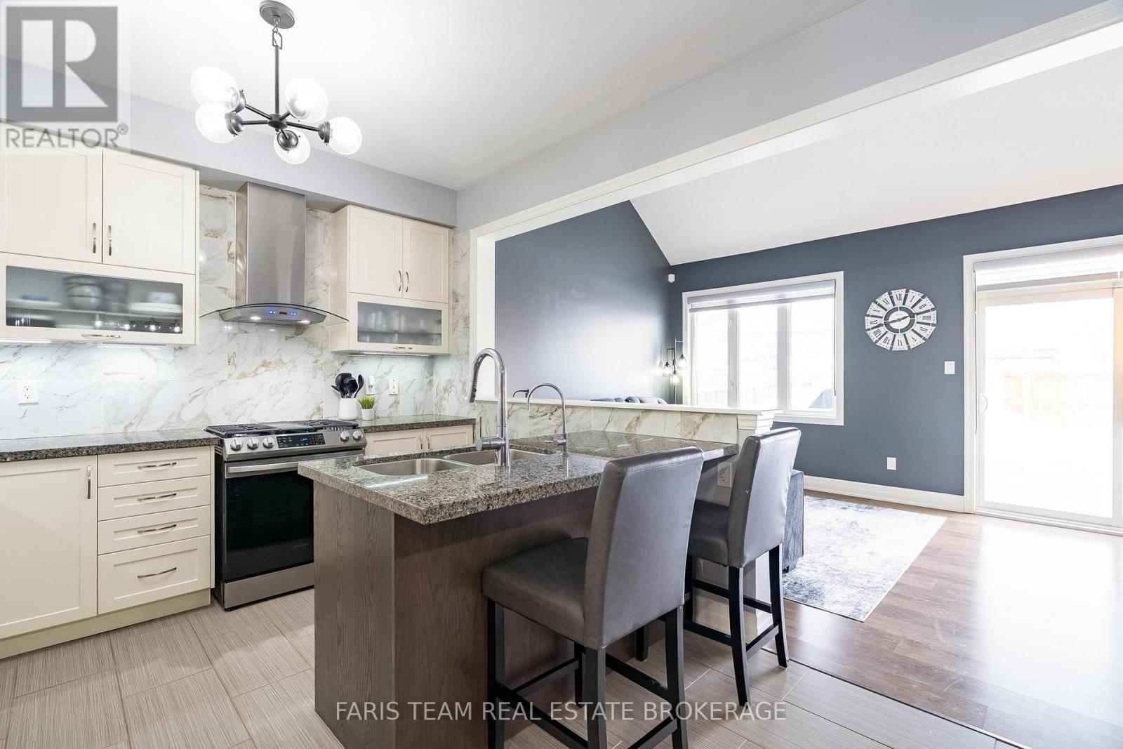 461 Greenwood Drive, Essa, Ontario  L3W 0R4 - Photo 6 - N12782160