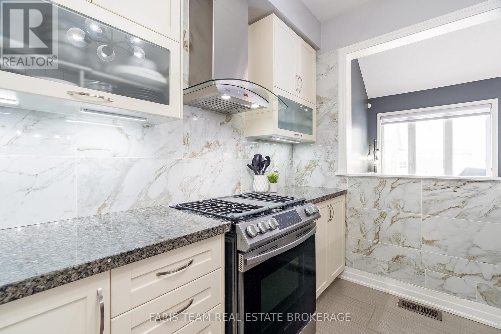 461 Greenwood Drive, Essa, Ontario  L3W 0R4 - Photo 7 - N12782160