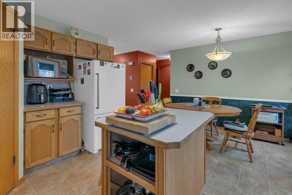 38 West Mcdougal Road, Cochrane, Alberta  T4C 1M4 - Photo 9 - A2285506