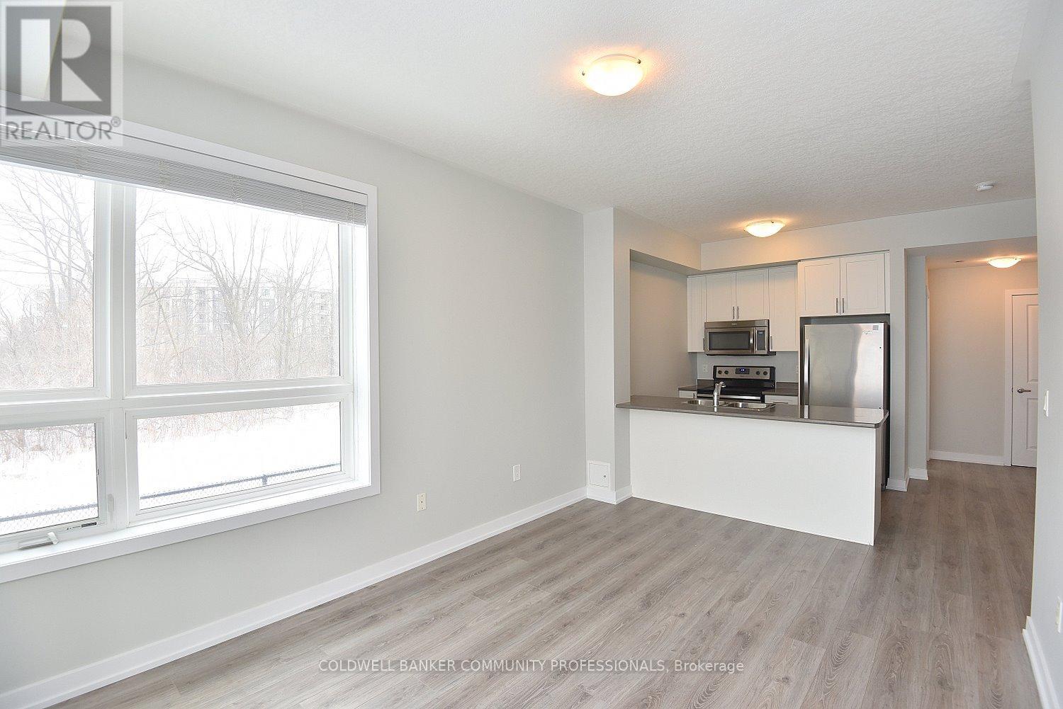 108 - 35 Southshore Crescent, Hamilton (Lakeshore), Ontario  L8E 0J2 - Photo 5 - X12782526