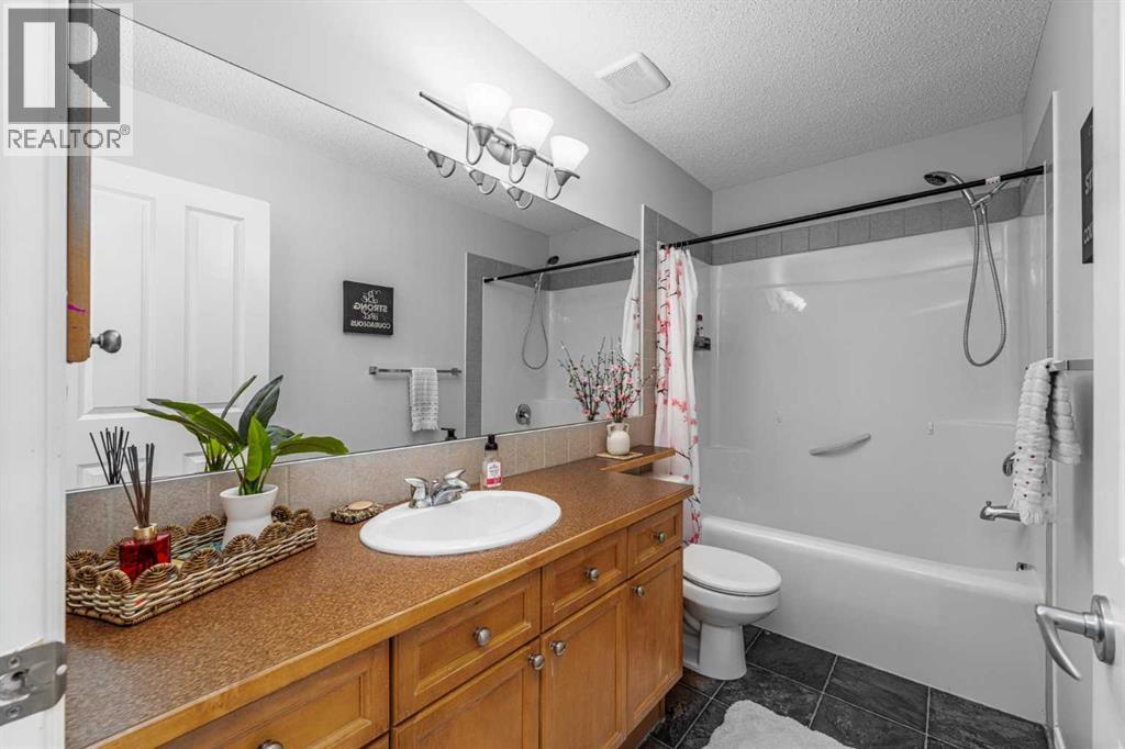 28 Crystal Shores Heights, Okotoks, Alberta  T1S 2K8 - Photo 27 - A2281479