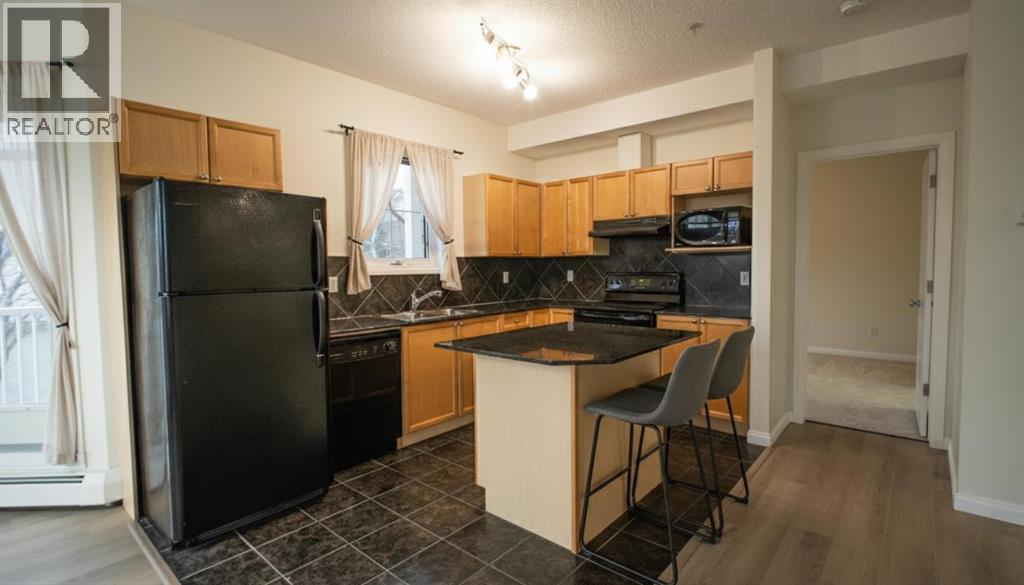 202, 8 Prestwick Pond Terrace Se, Calgary, Alberta  T2Z 4P3 - Photo 8 - A2259634