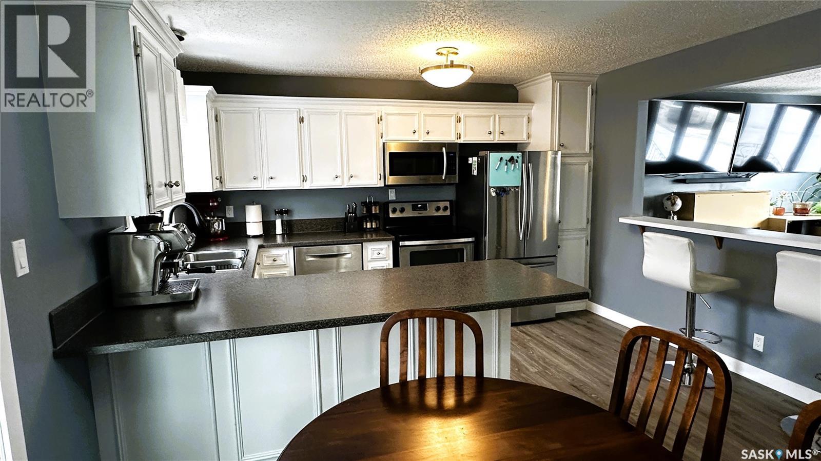 131 Dunsmore Drive, Regina, Saskatchewan  S4R 7G3 - Photo 9 - SK028325