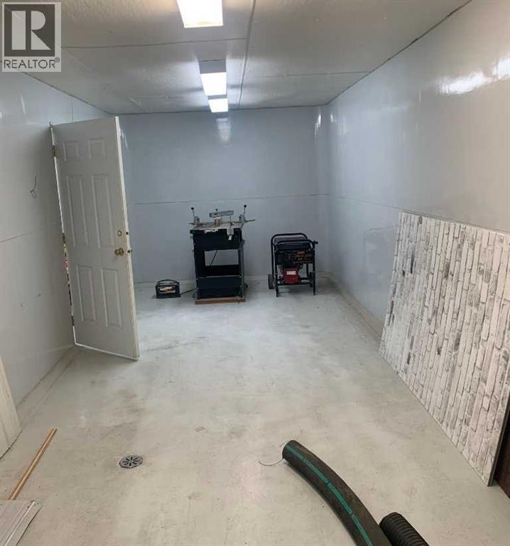 7 Co-Op Road, Didsbury, Alberta  T0M 0A2 - Photo 4 - A2280095