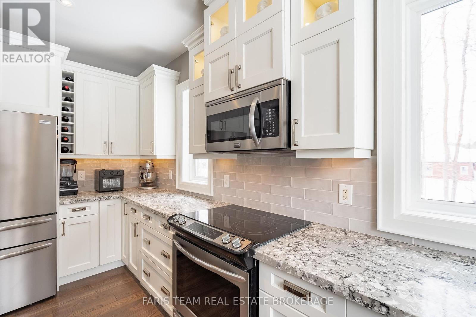 142 Mennill Drive, Springwater, Ontario  L9X 0J2 - Photo 6 - S12783244