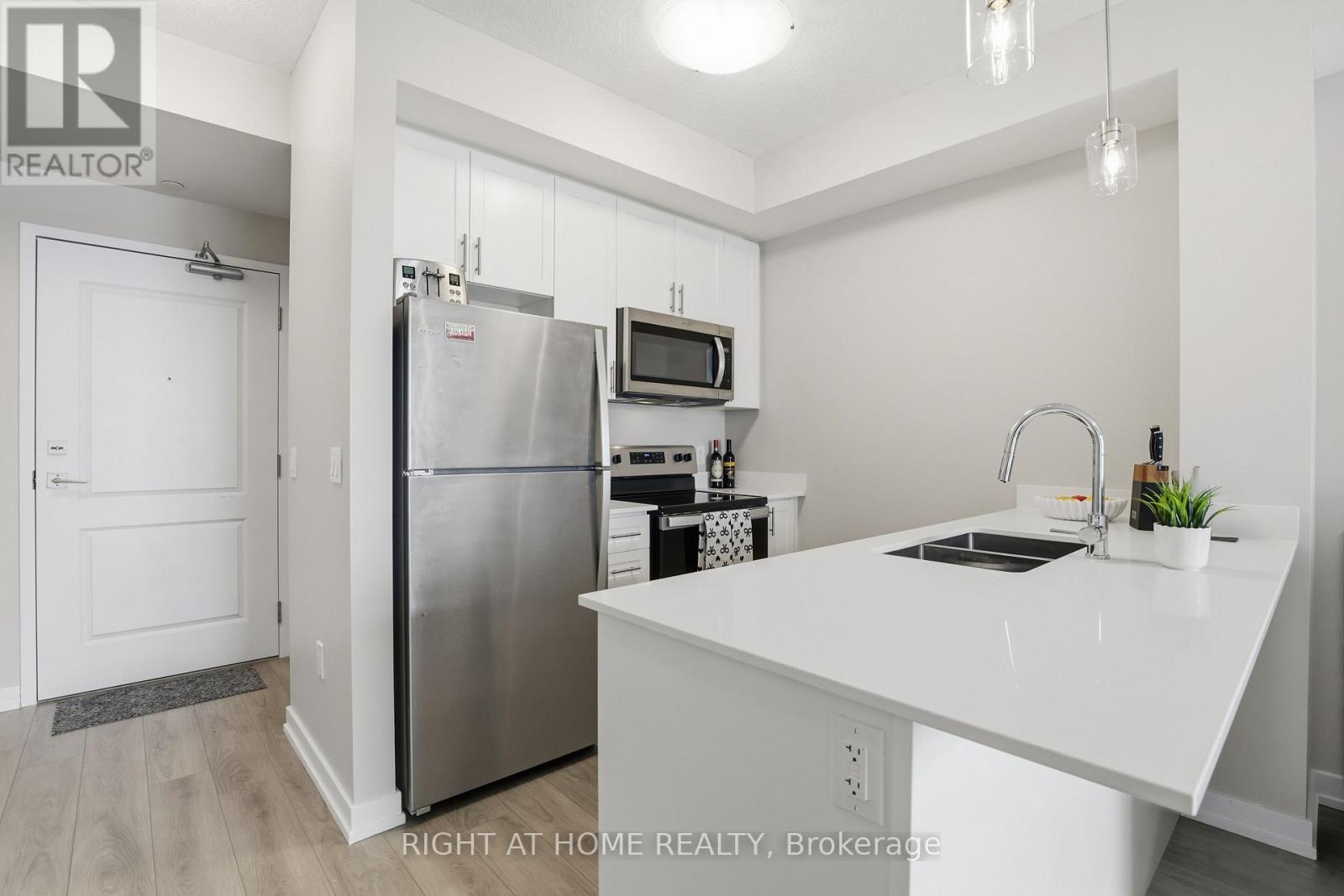 203 - 5055 Greenlane Road, Lincoln, Ontario  L3J 2J3 - Photo 5 - X12783110