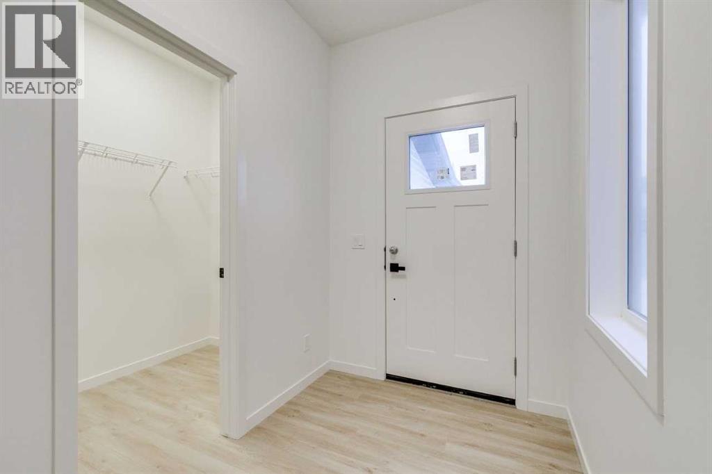 75 Fireside Common, Cochrane, Alberta  T4C 3E1 - Photo 4 - A2271464