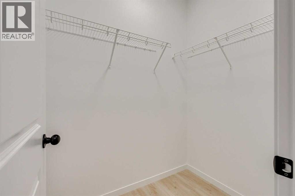 75 Fireside Common, Cochrane, Alberta  T4C 3E1 - Photo 5 - A2271464