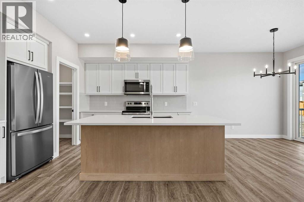 85 Quartz Crescent, Cochrane, Alberta  T4C 3G2 - Photo 7 - A2282373