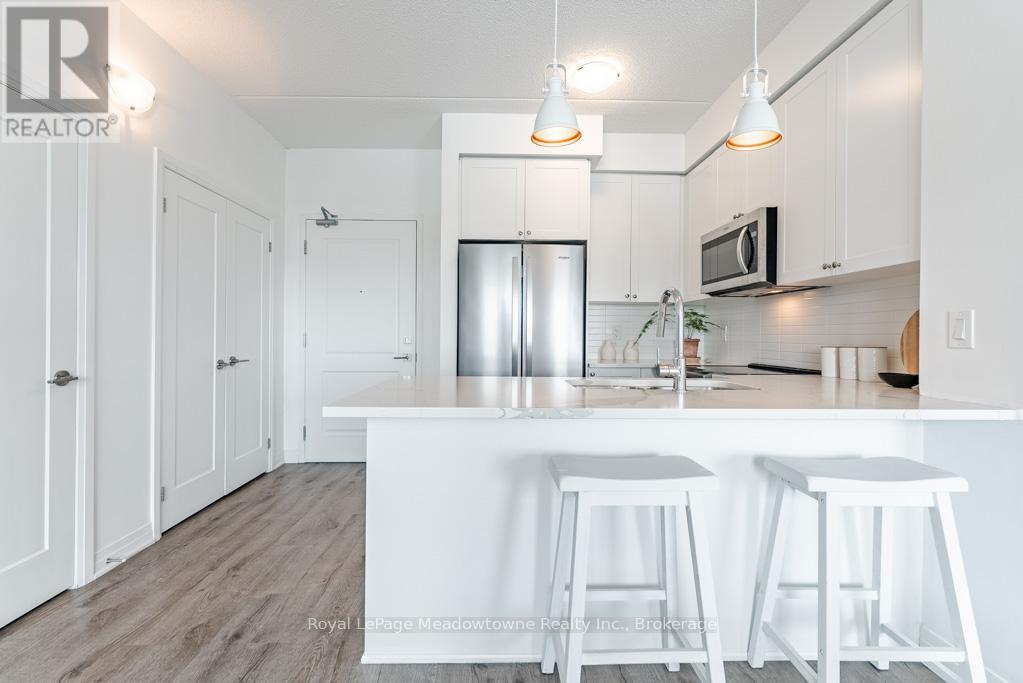 422 - 610 Farmstead Drive, Milton, Ontario  L9T 8X5 - Photo 3 - W12541266