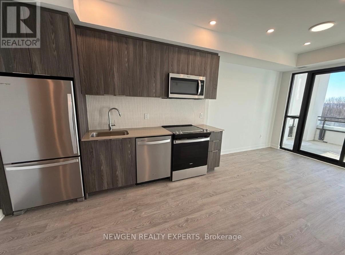 303 - 750 Whitlock Avenue, Milton, Ontario  L9E 1M4 - Photo 3 - W12783826