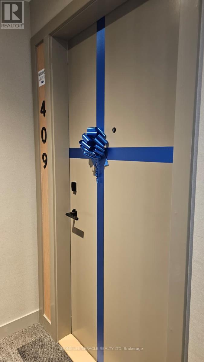 409 - 750 Whitlock Avenue, Milton, Ontario  L9E 2B4 - Photo 2 - W12783850