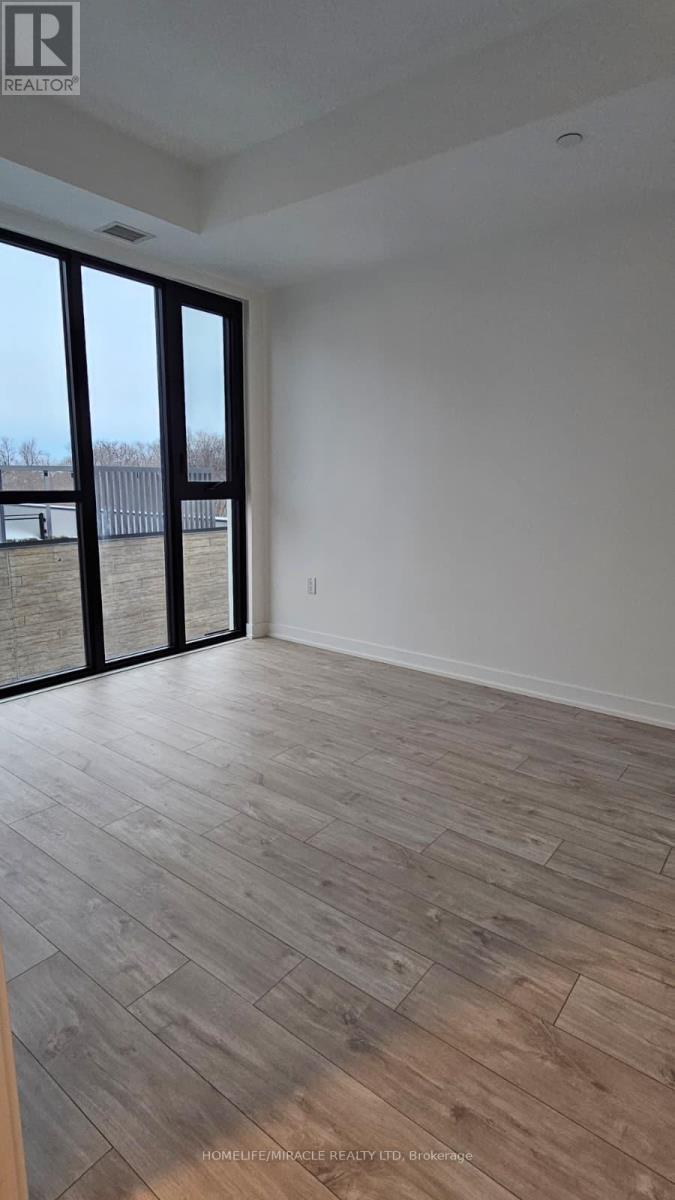 409 - 750 Whitlock Avenue, Milton, Ontario  L9E 2B4 - Photo 6 - W12783850