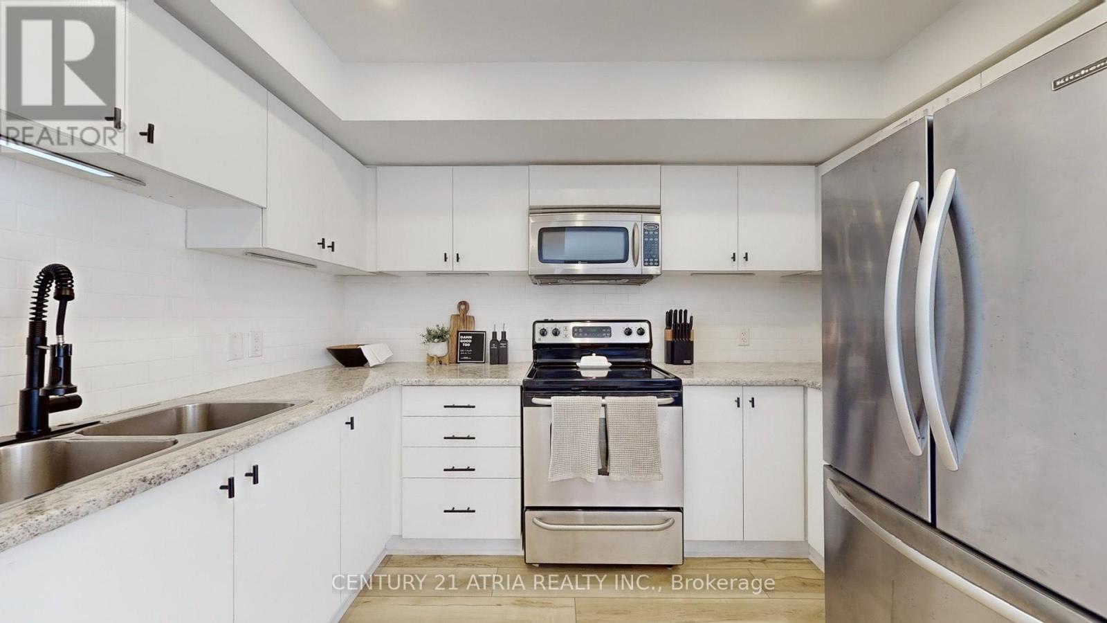 63 - 2441 Greenwich Drive, Oakville, Ontario  L6M 0S3 - Photo 4 - W12784002