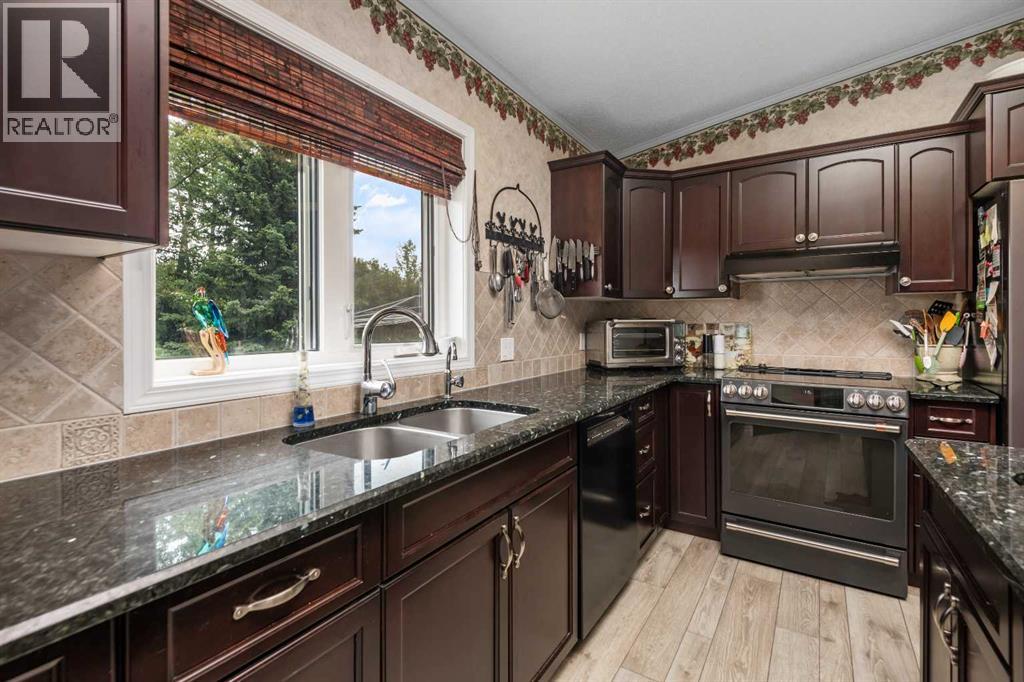 33194 Twp Rd 284, Rural Rocky View County, Alberta  T0M 1L0 - Photo 7 - A2245995