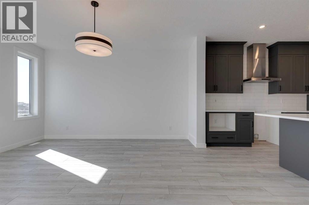 95 Southborough Crescent, Cochrane, Alberta  T4C 3J3 - Photo 7 - A2285095