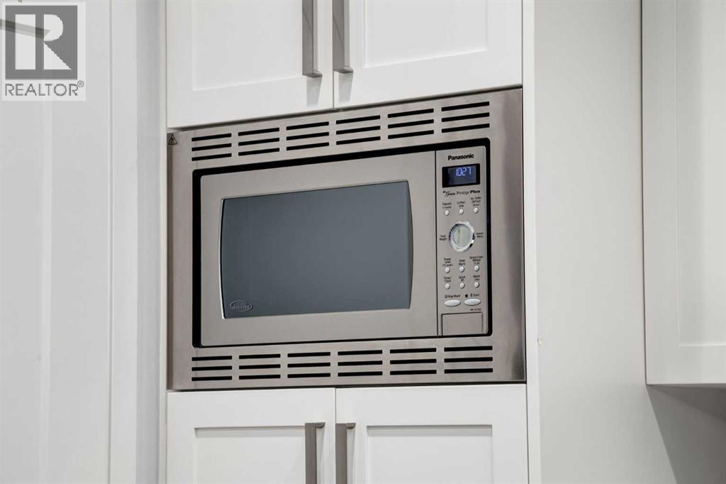 19 West Grove Place Sw, Calgary, Alberta  T3H 1Z4 - Photo 10 - A2246398