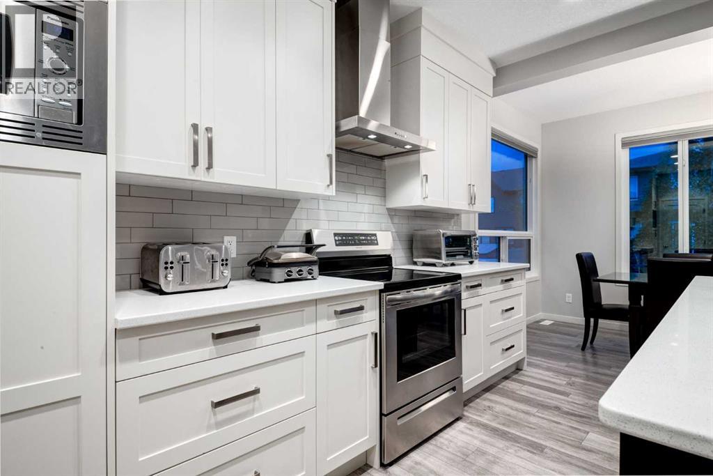 19 West Grove Place Sw, Calgary, Alberta  T3H 1Z4 - Photo 9 - A2246398