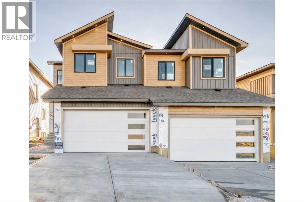516 Heritage Boulevard, Cochrane, Alberta  T4C 2J8 - Photo 1 - A2277144