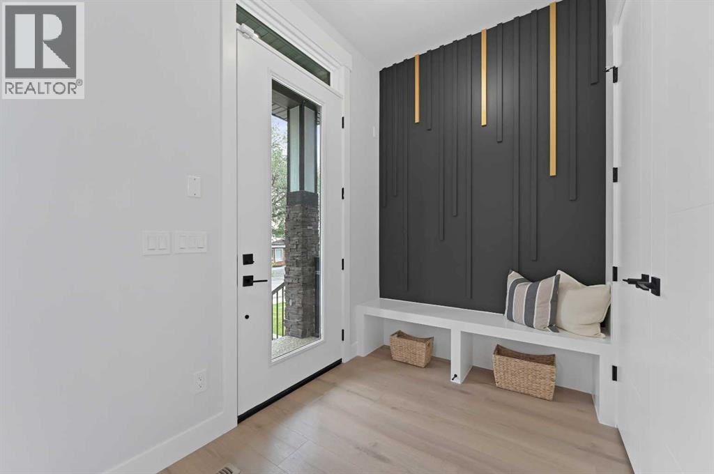 107 Hartford Road Nw, Calgary, Alberta  T2K 2A7 - Photo 3 - A2279523