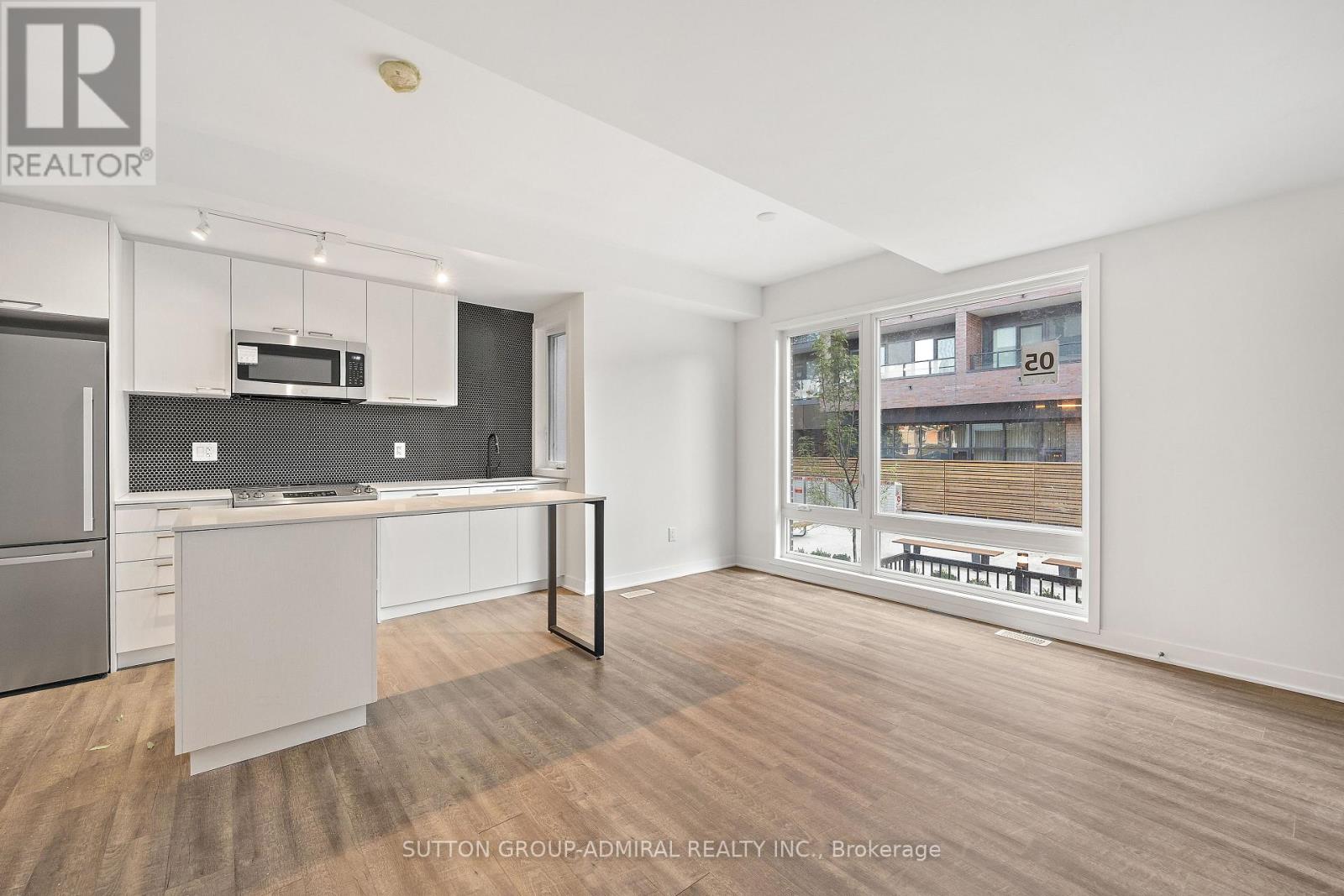 Th5 - 10 Ed Clark Gardens Boulevard, Toronto, Ontario  M6N 1J5 - Photo 4 - W12784570