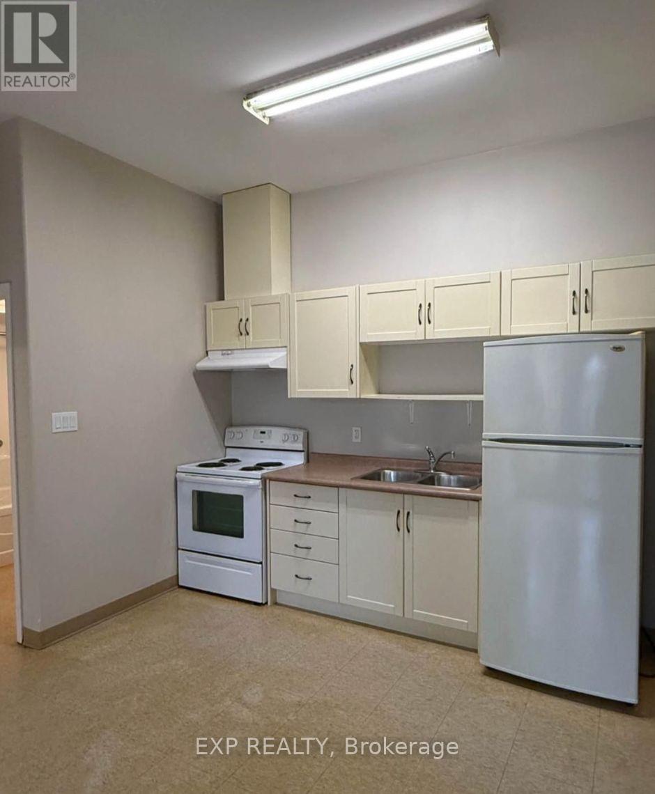 204 - 25 Winniett Street, Woodstock (Woodstock - North), Ontario  N4S 5Z4 - Photo 2 - X12784628