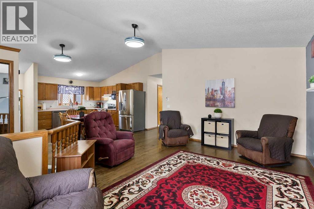 74 Sprucegrove Way Se, Airdrie, Alberta  T4B 2E1 - Photo 4 - A2276250