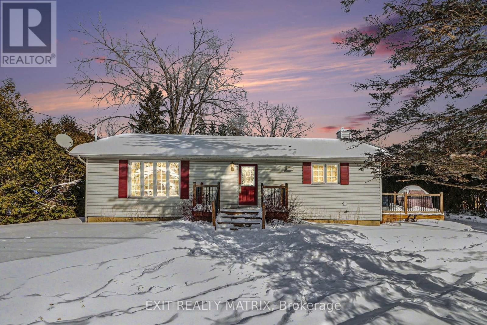 * OPEN HOUSE SUNDAY FEBRUARY 15TH 2-4PM* Experience the perfect balance of rural tranquility and city convenience with this charming 3+1 bedroom bungalow in the sought-after community of Carlsbad Springs. Ideally located just 5 minutes from Highway access and only 20 minutes to downtown Ottawa, you get peaceful country living without sacrificing commute time. Set on a private half-acre lot, this property offers exceptional usable green space with room to relax, entertain, garden, or expand your outdoor vision. At the rear of the property, enjoy direct access to maintained greenspace via a custom-built wooden bridge - creating an extended outdoor retreat that feels even larger and is maintained year-round. Inside, the bright open-concept main floor is filled with natural light and features a modern, upgraded kitchen designed for everyday living and effortless entertaining. The fully finished basement adds flexibility with a fourth bedroom, full bathroom, and generous storage space. A true standout feature is the impressive 25 x 40 ft heated detached shop. Previously used as a welding shop, it is fire-safe, meets insurance requirements, and already upgraded for serious work. Whether you're a welder, mechanic, hobbyist, car enthusiast, or small business owner, this professional-grade workspace is ready to go - saving you significant time and retrofit costs. With half an acre of land, maintained greenspace access, highway convenience, and a fully equipped heated shop, this property offers a rare combination of lifestyle and functionality. Don't miss out, book your showing today! (id:48254)