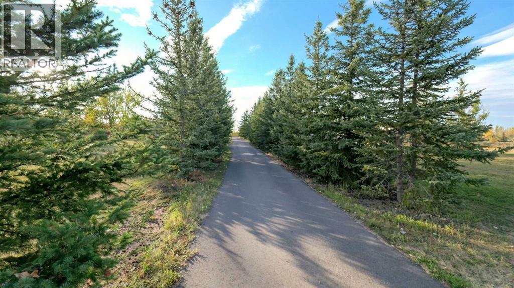 247 Shore Drive, Rural Rocky View County, Alberta  T2M 4L5 - Photo 2 - A2262909