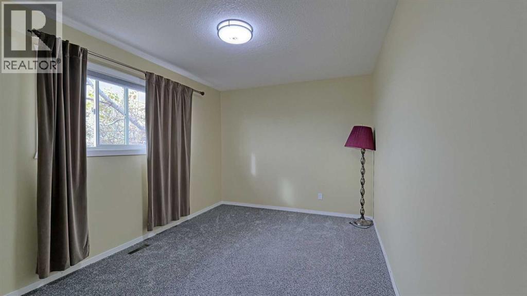 247 Shore Drive, Rural Rocky View County, Alberta  T2M 4L5 - Photo 19 - A2262909